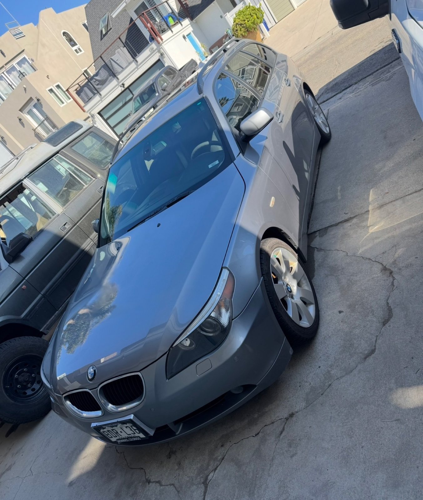 Same BMW after paint correction, glossy restored finish